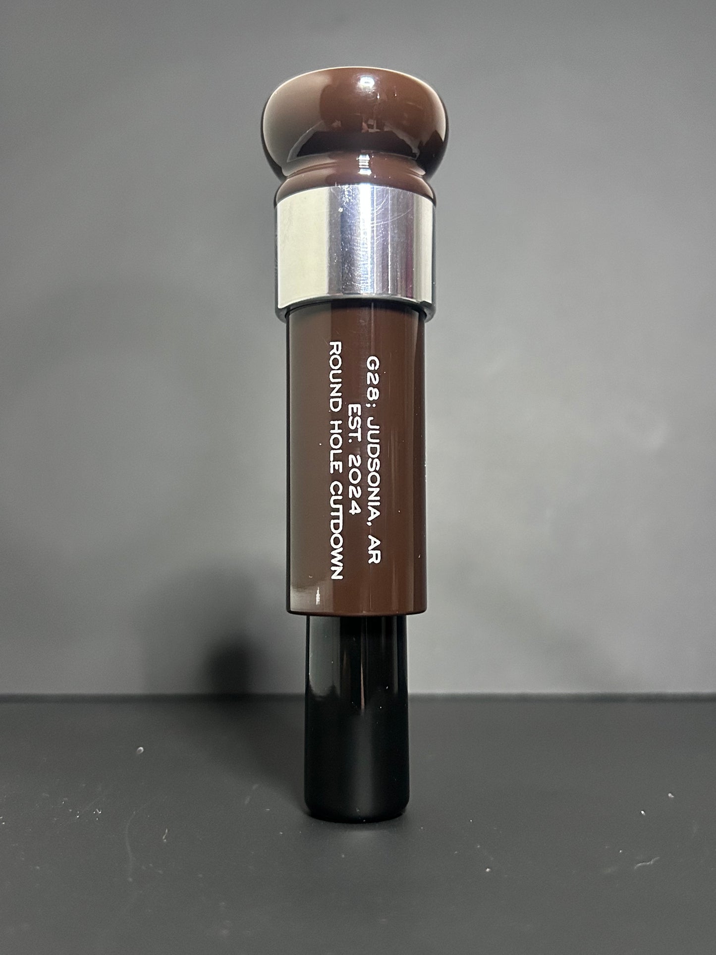 Brown, aluminum and black polished Roundhole cutdown