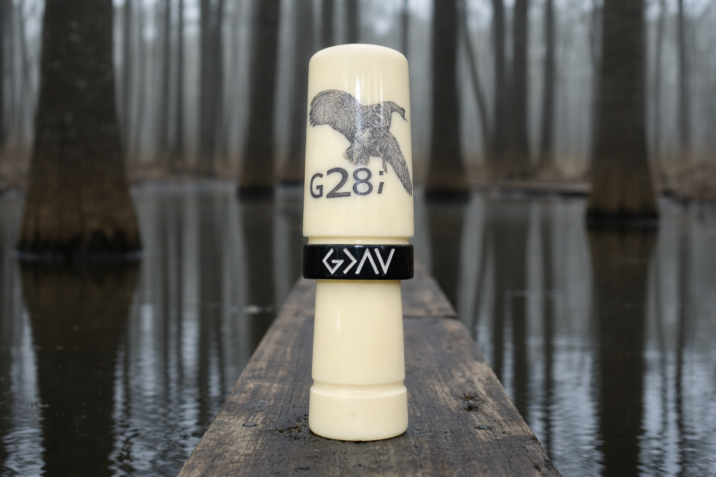 Ivory and black polished speck goose call