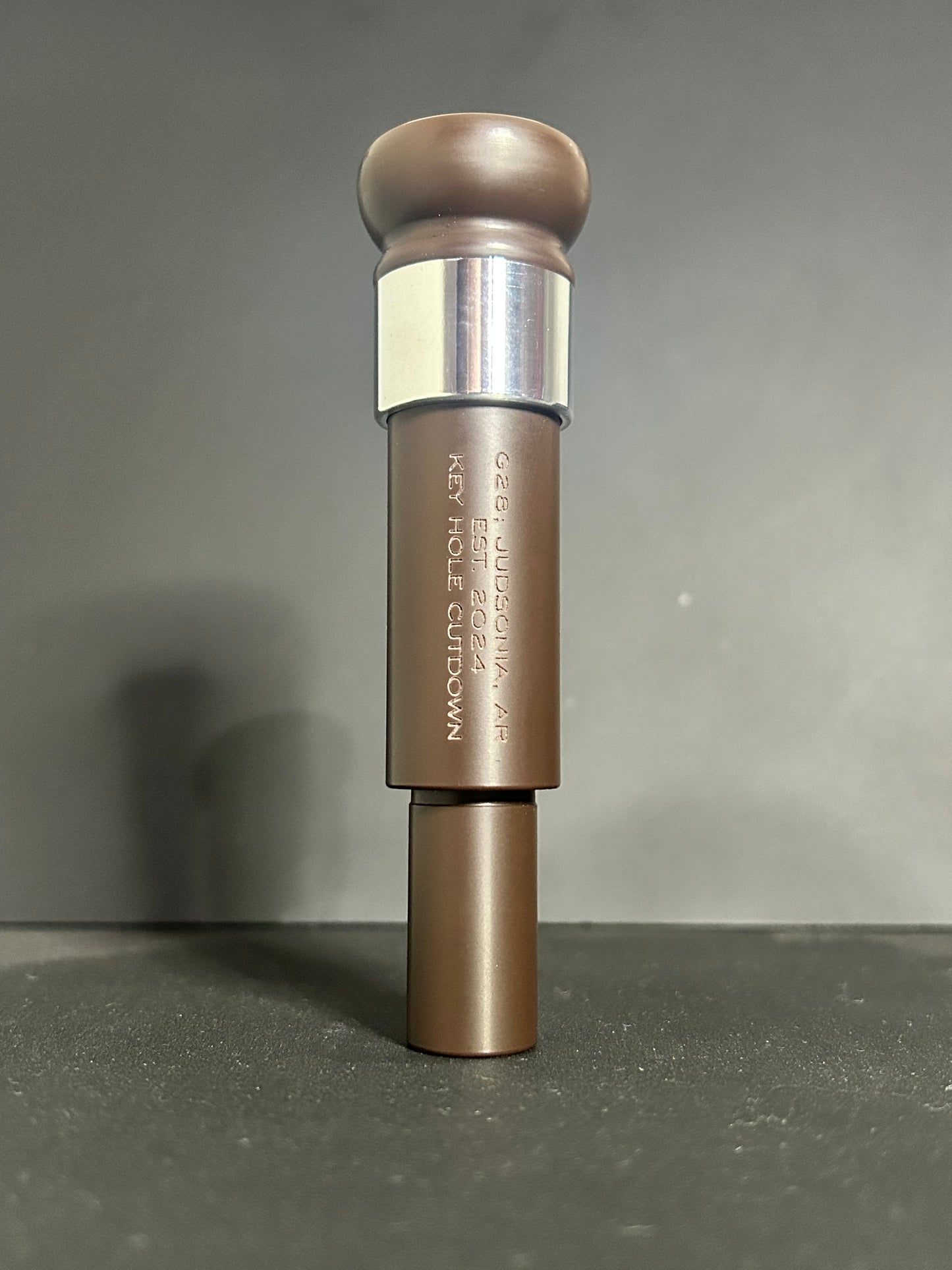 Unpolished brown with aluminum band acrylic keyhole