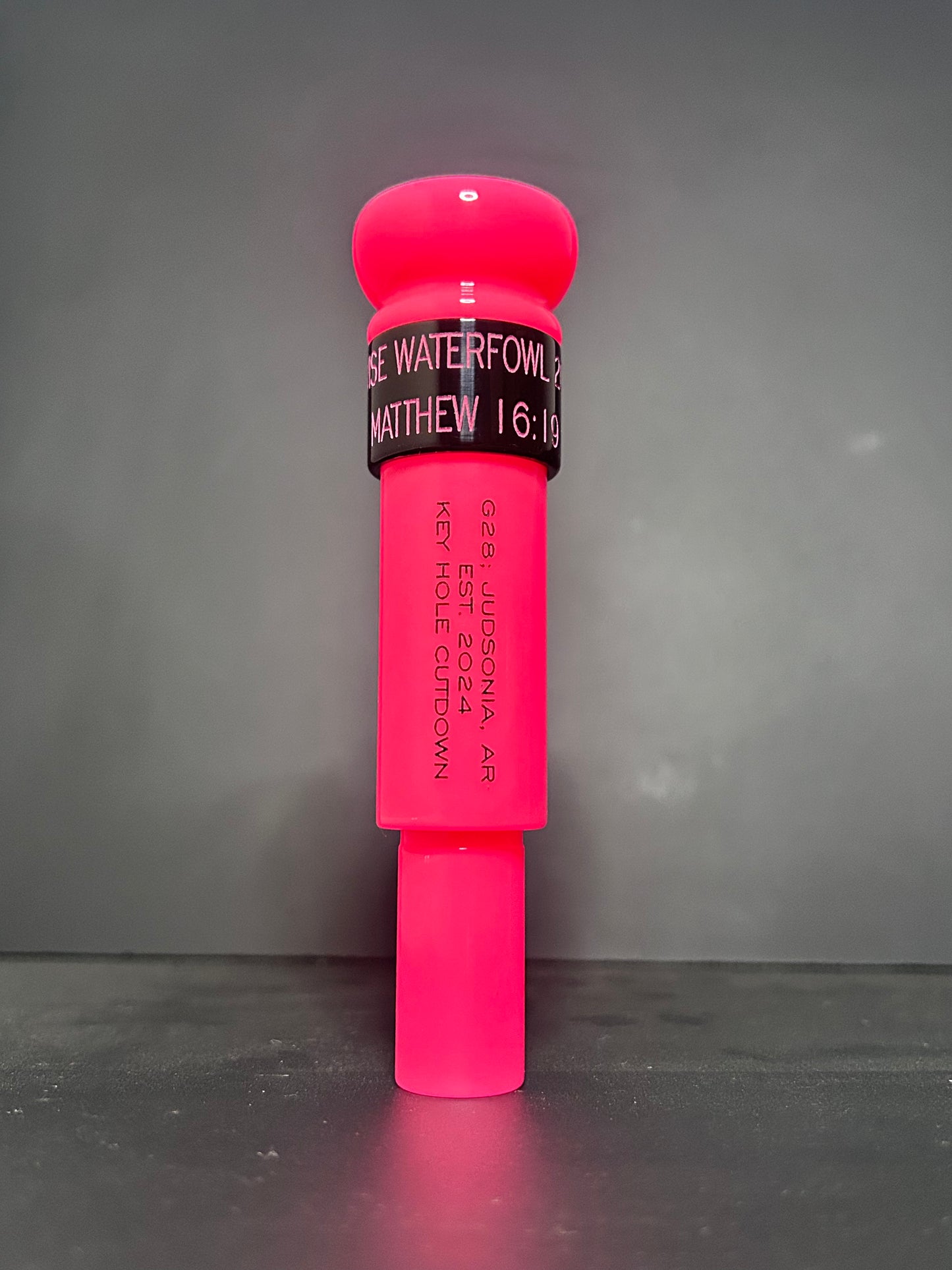 Pink and black polished acrylic keyhole