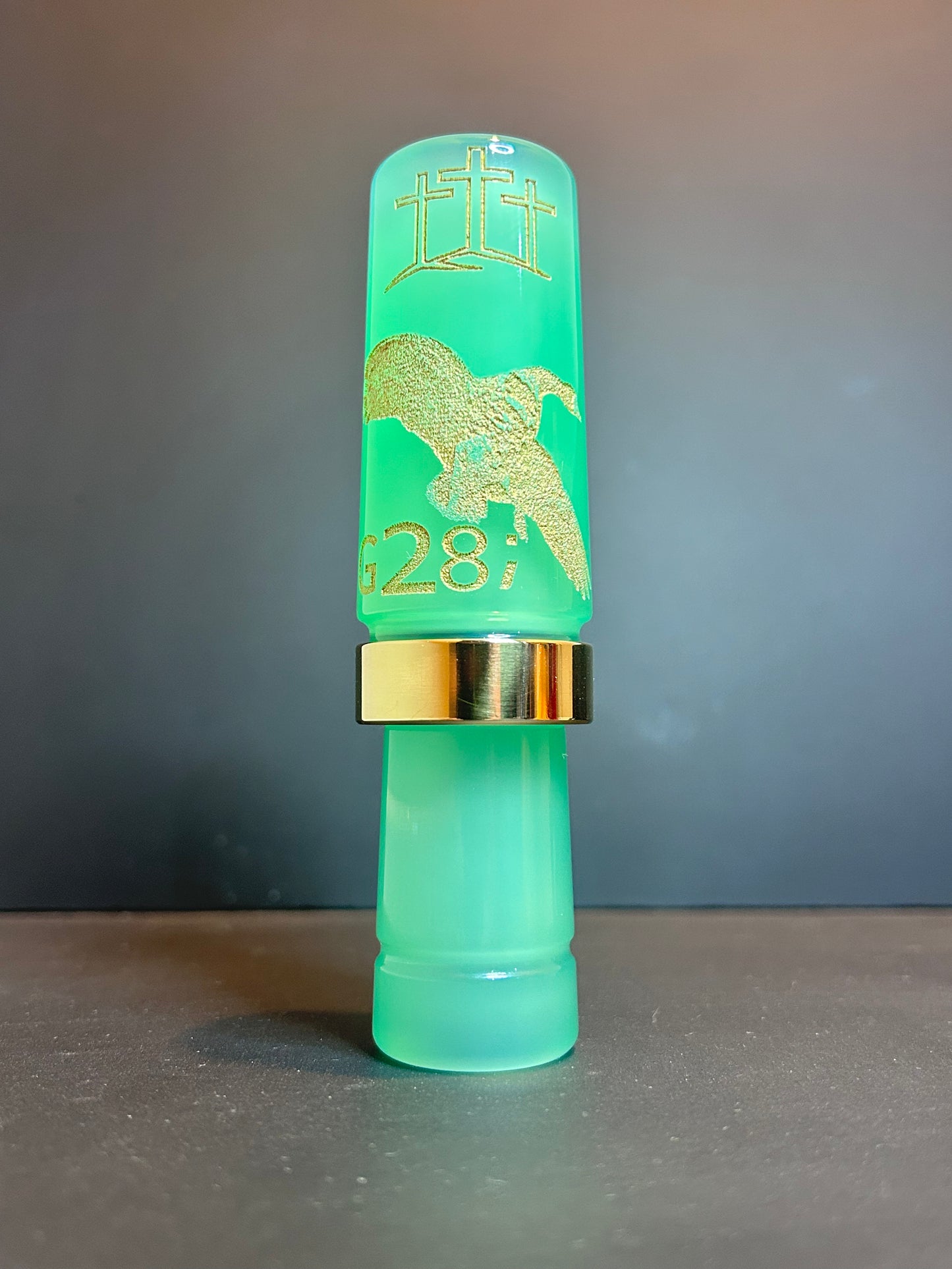 Jade and gold polished speck goose call